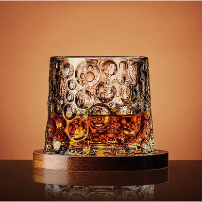 Rotating Whisky Glass – spinning rounded base, cut-glass pattern, four styles