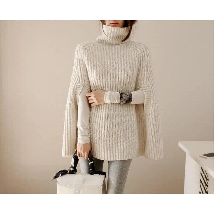 Cape Turtleneck Jumper – ribbed knit, oversized fit, split sleeves