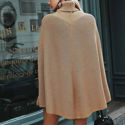 Cape Turtleneck Jumper – ribbed knit, oversized fit, split sleeves
